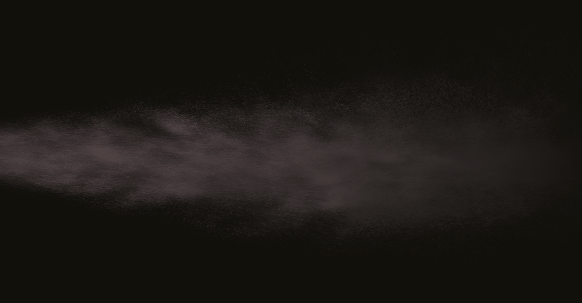 Immagine nera con una scia bianca.